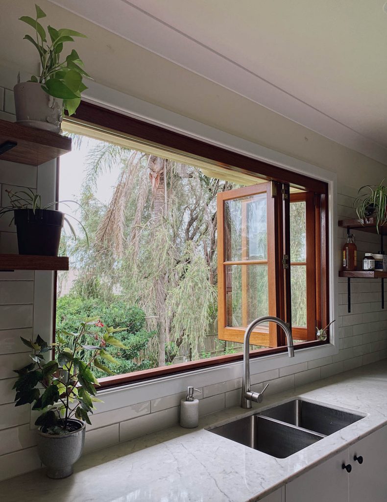 premium quality custom timber bifold windows above the kitchen sink